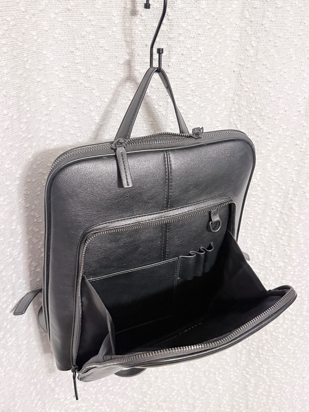 Minimalist Black Vegan Leather Backpack with Front Pocket - Picture 5 of 9